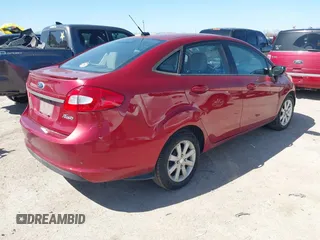 2013 Ford Fiesta SE z VIN 3FADP4BJ0DM107682, wystawiony jako IAAI lot #41772631 z przebiegiem 146 760 mil mil oraz . Historia ofert i sprzedaży dostępna na DreamBid. Obrazek 4.
