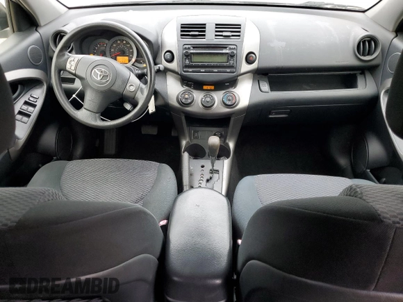 2012 Toyota RAV4 Sport with VIN JTMRF4DV5CD044821, listed as a Copart auction lot 61555935 with 94,301 mi miles and Salvage title. Bid and sale history available at DreamBid. Image 8.