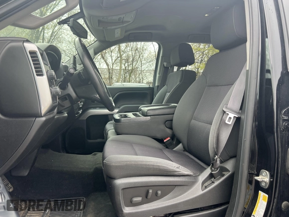 2014 Chevrolet Silverado 1500 LT with VIN 1GCVKREH1EZ169899, listed as a IAAI auction lot 42143501 with 124,789 mi miles and . Bid and sale history available at DreamBid. Image 5.