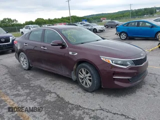 2016 Kia Optima LX z VIN 5XXGT4L36GG120395, wystawiony jako IAAI lot #42419023 z przebiegiem 172 858 mil mil oraz . Historia ofert i sprzedaży dostępna na DreamBid. Obrazek 1.