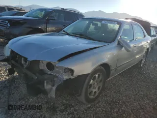 2001 Mazda 626 LX with VIN 1YVGF22C715241262, listed as a Copart auction lot 74259924 with 86,085 mi miles and Salvage Title. Bid and sale history available at carsss.com. Image 1.