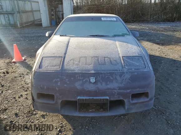 1986 Pontiac Fiero z VIN 1G2PF3793GP210763, wystawiony jako Copart lot #41891075 z przebiegiem 144 219 mil mil oraz Czysty tytuł • Clean title. Historia ofert i sprzedaży dostępna na DreamBid. Obrazek 5.