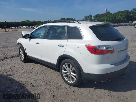 2011 Mazda CX-9 Grand Touring with VIN JM3TB2DA4B0305811, listed as a IAAI auction lot 42092829 with 232,298 mi miles and . Bid and sale history available at DreamBid. Image 3.