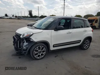 2014 FIAT 500L Trekking with VIN ZFBCFADH2EZ019009, listed as a Copart auction lot 50581325 with 61,745 mi miles and Salvage Title. Bid and sale history available at DreamBid. Image 1.
