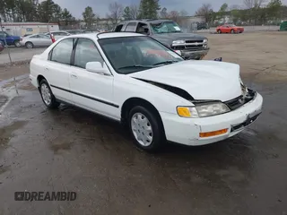 1996 Honda Accord LX with VIN 1HGCD5633TA266516, listed as a IAAI auction lot 41839684 with 162,523 mi miles and . Bid and sale history available at carsss.com. Image 1.