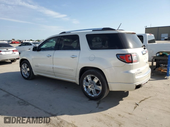 2014 GMC Acadia Denali z VIN 1GKKVTKD2EJ358735, wystawiony jako Copart lot #52299545 z przebiegiem 192 817 mil mil oraz Czysty tytuł • Clean title. Historia ofert i sprzedaży dostępna na DreamBid. Obrazek 2.
