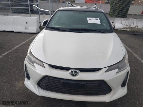 2016 Scion tC with VIN JTKJF5C75GJ014448, listed as a IAAI auction lot 41755541 with 60,571 mi miles. Bid and sale history available at carsss.com. Image 12.