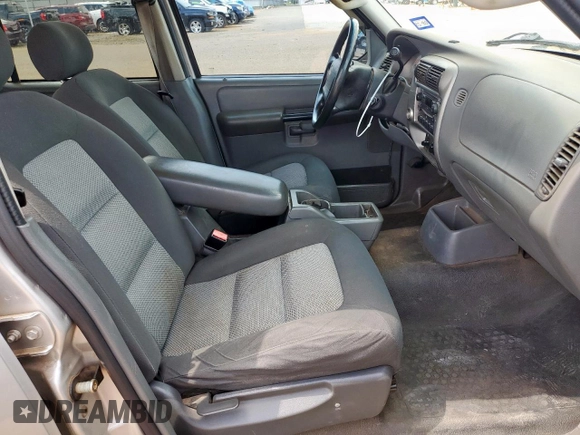 2005 Ford Explorer Sport Trac XLS with VIN 1FMZU67K95UA94980, listed as a Copart auction lot 63490315 with 126,737 mi miles and Salvage title. Bid and sale history available at DreamBid. Image 7.