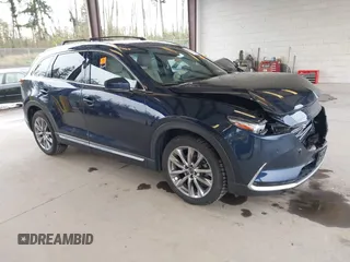2018 Mazda CX-9 Grand Touring with VIN JM3TCBDY0J0216195, listed as a IAAI auction lot 41976122 with 90,083 mi miles and . Bid and sale history available at carsss.com. Image 1.