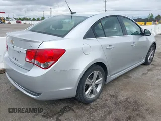 2012 Chevrolet Cruze LT w/2LT with VIN 1G1PG5SC4C7284915, listed as a IAAI auction lot 42064590 with 143,418 mi miles. Bid and sale history available at carsss.com. Image 4.