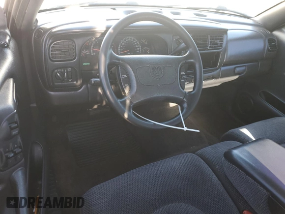 1999 Dodge Dakota SLT z VIN 1B7GL22X9XS188317, wystawiony jako Copart lot #47997795 z przebiegiem 125 090 mil mil oraz Szkoda całkowita • Salvage title. Historia ofert i sprzedaży dostępna na DreamBid. Obrazek 8.