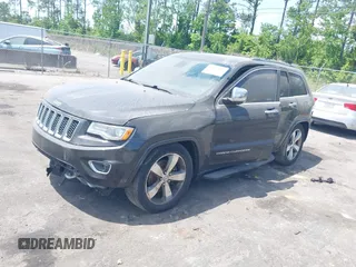 2015 Jeep Grand Cherokee Overland with VIN 1C4RJFCT9FC859740, listed as a IAAI auction lot 42187933 with 231,481 mi miles. Bid and sale history available at carsss.com. Image 2.