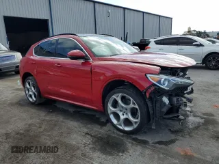 2023 Alfa Romeo Stelvio Ti z VIN ZASPAKBN2P7D65711, wystawiony jako Copart lot #55311535 z przebiegiem 32 906 mil mil oraz Nie do naprawy. Historia ofert i sprzedaży dostępna na DreamBid. Obrazek 4.