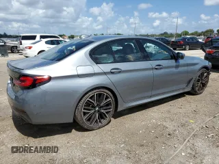 2023 BMW 5 Series 530i with VIN WBA53BH02PCM55841, listed as a Copart auction lot 58391765 with 6,947 mi miles and Salvage title. Bid and sale history available at DreamBid. Image 3.