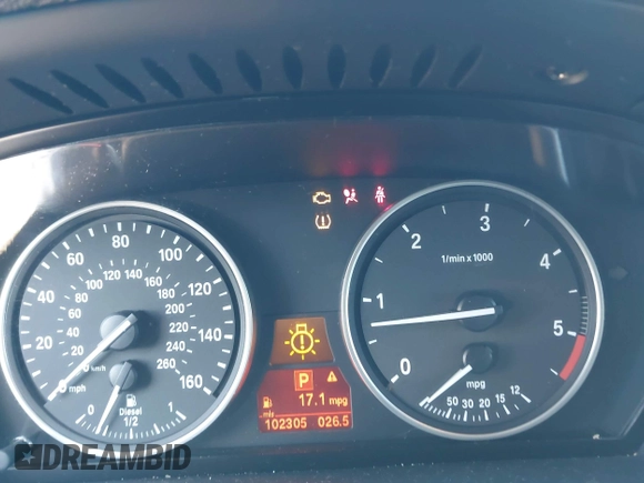 2012 BMW X5 35d with VIN 5UXZW0C51CL669957, listed as a IAAI auction lot 42230292 with 102,305 mi miles and . Bid and sale history available at DreamBid. Image 7.