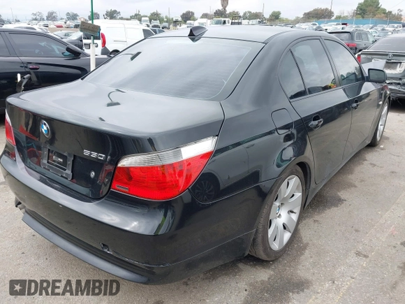 2007 BMW 5 Series 530i with VIN WBANE73577CM57997, listed as a IAAI auction lot 41461292 with 220,424 mi miles. Bid and sale history available at carsss.com. Image 4.