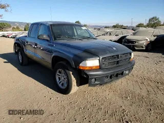 2004 Dodge Dakota Sport with VIN 1D7HL38NX4S789687, listed as a Copart auction lot 77435824 with 157,993 mi miles and Salvage Title. Bid and sale history available at carsss.com. Image 11.