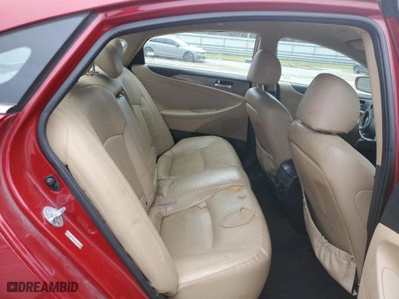 2013 Hyundai Sonata Hybrid with VIN KMHEC4A49DA081128, listed as a Copart auction lot 44517285 with 130,565 mi miles and Clean Title. Bid and sale history available at carsss.com. Image 10.