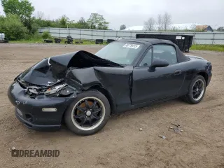 1999 Mazda MX-5 Miata z VIN JM1NB3531X0102616, wystawiony jako Copart lot #59779415 z przebiegiem 194 494 mil mil oraz Szkoda całkowita • Salvage title. Historia ofert i sprzedaży dostępna na DreamBid. Obrazek 1.
