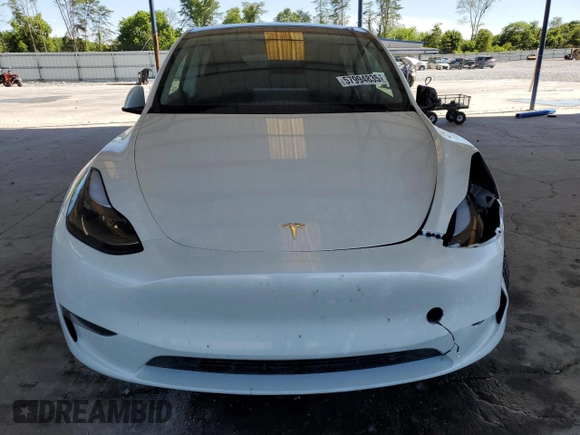 2024 Tesla Model Y с VIN 7SAYGDED5RF086456, выставлен на аукционе Copart как лот 57994835 с пробегом Не указан миль и Списание • Salvage title. История ставок и продаж доступна на DreamBid. Изображение 5.
