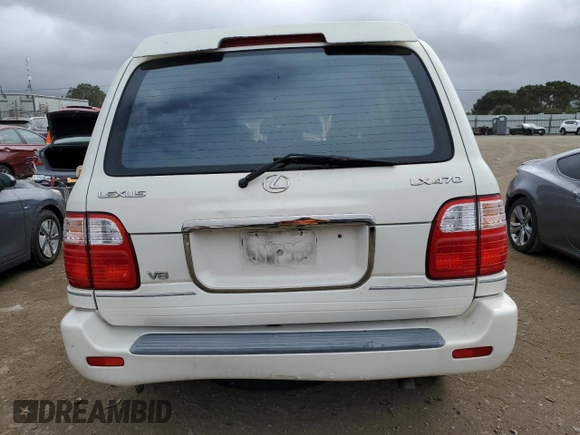 2002 Lexus LX 470 z VIN JTJHT00W423522126, wystawiony jako Copart lot #56582855 z przebiegiem 280 679 mil mil oraz Szkoda całkowita • Salvage title. Historia ofert i sprzedaży dostępna na DreamBid. Obrazek 6.