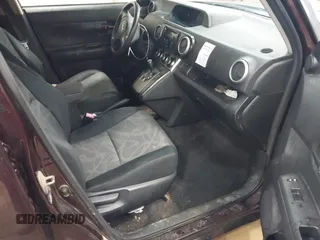 2013 Scion xB z VIN JTLZE4FE9DJ038317, wystawiony jako IAAI lot #42356060 z przebiegiem 189 871 mil mil oraz . Historia ofert i sprzedaży dostępna na DreamBid. Obrazek 5.