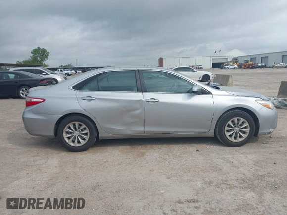 2015 Toyota Camry XLE z VIN 4T4BF1FK3FR481404, wystawiony jako IAAI lot #42131671 z przebiegiem 108 408 mil mil oraz . Historia ofert i sprzedaży dostępna na DreamBid. Obrazek 13.