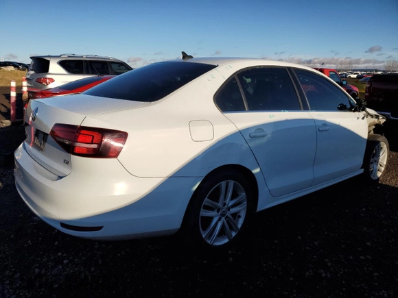 2016 Volkswagen Jetta SEL z VIN 3VWL07AJ9GM401449, wystawiony jako Copart lot #79489034 z przebiegiem 156 918 mil mil oraz Szkoda całkowita • Salvage title. Historia ofert i sprzedaży dostępna na DreamBid. Obrazek 3.