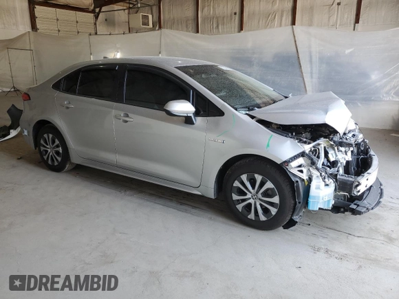 2021 Toyota Corolla Hybrid LE with VIN JTDEAMDE4MJ018825, listed as a Copart auction lot 50895965 with 93,988 mi miles and Salvage Title. Bid and sale history available at carsss.com. Image 4.