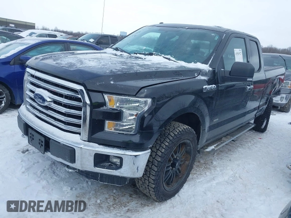 2015 Ford F-150 XLT with VIN 1FTEX1EP7FFC90014, listed as a IAAI auction lot 41581927 with 178,955 mi miles. Bid and sale history available at carsss.com. Image 2.