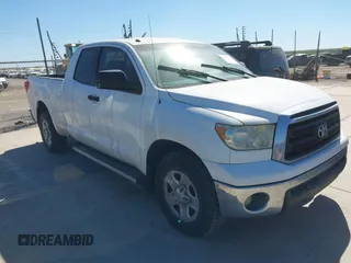 2012 Toyota Tundra z VIN 5TFRM5F10CX051275, wystawiony jako IAAI lot #41832375 z przebiegiem 209 806 mil mil oraz . Historia ofert i sprzedaży dostępna na DreamBid. Obrazek 1.