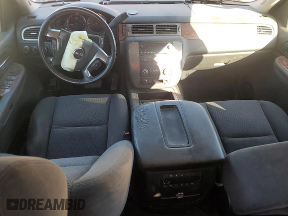 2007 GMC Yukon SLT with VIN 1GKFK13037J101824, listed as a Copart auction lot 77865294 with 179,884 mi miles and Salvage Title. Bid and sale history available at DreamBid. Image 8.