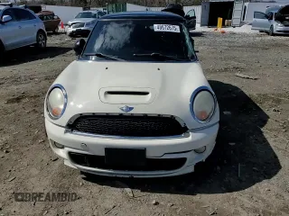 2011 MINI Hardtop S with VIN WMWSV3C59BTY23205, listed as a Copart auction lot 48672675 with 120,457 mi miles and Salvage Title. Bid and sale history available at DreamBid. Image 11.