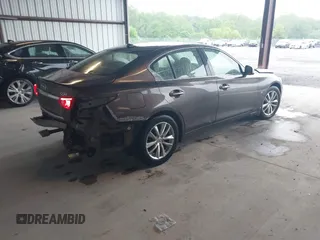 2015 Infiniti Q50 Premium z VIN JN1BV7AR0FM393387, wystawiony jako IAAI lot #42257850 z przebiegiem 176 436 mil mil oraz . Historia ofert i sprzedaży dostępna na DreamBid. Obrazek 4.