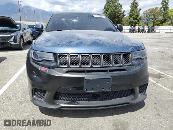 2020 Jeep Grand Cherokee Trackhawk z VIN 1C4RJFN94LC314087, wystawiony jako Copart lot #51484835 z przebiegiem 38 306 mil mil oraz Szkoda całkowita • Salvage title. Historia ofert i sprzedaży dostępna na DreamBid. Obrazek 5.