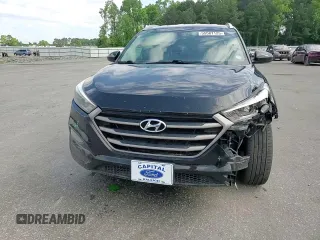 2016 Hyundai Tucson SE z VIN KM8J3CA41GU222107, wystawiony jako Copart lot #55587125 z przebiegiem 99 918 mil mil oraz Szkoda całkowita • Salvage title. Historia ofert i sprzedaży dostępna na DreamBid. Obrazek 14.