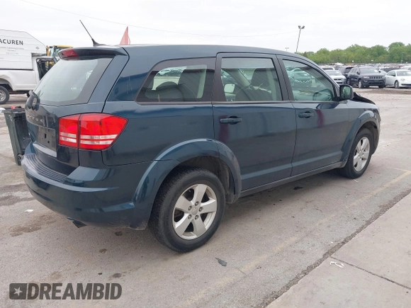2013 Dodge Journey American Value with VIN 3C4PDCAB8DT602979, listed as a IAAI auction lot 42318493 with 179,210 mi miles and . Bid and sale history available at DreamBid. Image 4.
