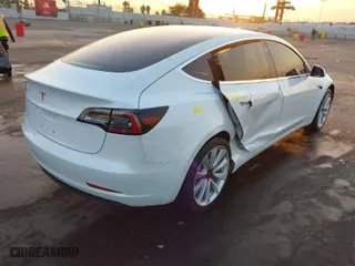 2018 Tesla Model 3 Long Range Battery with VIN 5YJ3E1EA1JF164821, listed as a IAAI auction lot 41277446 with 31,602 mi miles. Bid and sale history available at carsss.com. Image 4.