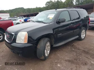2012 GMC Yukon SLT with VIN 1GKS1CE09CR141878, listed as a IAAI auction lot 41552512 with 204,253 mi miles. Bid and sale history available at carsss.com. Image 2.