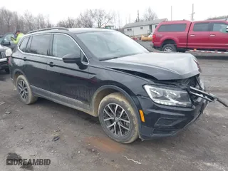2021 Volkswagen Tiguan SE with VIN 3VV2B7AX0MM049291, listed as a IAAI auction lot 41910106 with 68,468 mi miles. Bid and sale history available at carsss.com. Image 1.