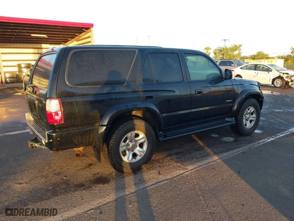 2002 Toyota 4Runner SR5 with VIN JT3GN86R920245780, listed as a IAAI auction lot 41155003 with 213,659 mi miles. Bid and sale history available at carsss.com. Image 4.