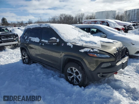 2014 Jeep Cherokee Trailhawk with VIN 1C4PJMBS2EW310818, listed as a Copart auction lot 44581755 with 105,560 mi miles and Non repairable. Bid and sale history available at DreamBid. Image 4.