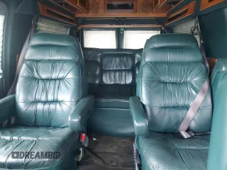 1999 Ford Econoline Cargo Recreational with VIN 1FDRE14L3XHA31771, listed as a Copart auction lot 49973795 with 220,268 mi miles and Salvage title. Bid and sale history available at DreamBid. Image 10.