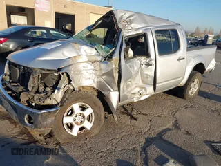2006 Nissan Frontier SE z VIN 1N6AD07W66C470766, wystawiony jako IAAI lot #41023377 z przebiegiem Nie podano mil oraz . Historia ofert i sprzedaży dostępna na DreamBid. Obrazek 18.