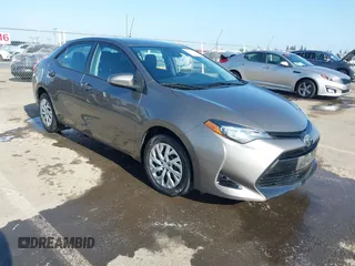 2019 Toyota Corolla L z VIN 2T1BURHE1KC136602, wystawiony jako IAAI lot #42215147 z przebiegiem 56 281 mil mil oraz . Historia ofert i sprzedaży dostępna na DreamBid. Obrazek 1.