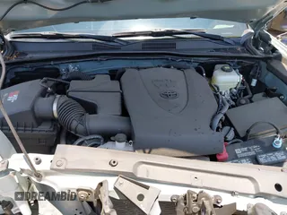 2022 Toyota Tacoma SR with VIN 3TYCZ5AN0NT104300, listed as a IAAI auction lot 42652503 with 18,071 mi miles and . Bid and sale history available at DreamBid. Image 10.