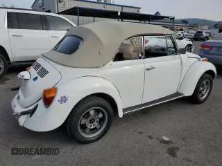 1976 Volkswagen Beetle with VIN 1562109448, listed as a Copart auction lot 48536135 with 10,295 mi miles and Salvage Title. Bid and sale history available at DreamBid. Image 3.