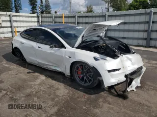 2023 Tesla Model 3 z VIN 5YJ3E1EA7PF576489, wystawiony jako Copart lot #61039505 z przebiegiem 35 243 mil mil oraz Nie do naprawy • Non repairable. Historia ofert i sprzedaży dostępna na DreamBid. Obrazek 4.