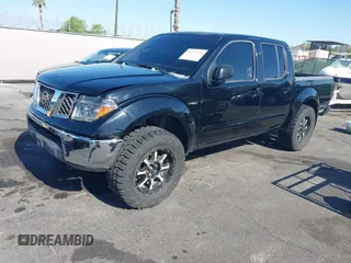 2006 Nissan Frontier SE z VIN 1N6AD07WX6C458569, wystawiony jako IAAI lot #42317531 z przebiegiem 198 485 mil mil oraz . Historia ofert i sprzedaży dostępna na DreamBid. Obrazek 12.