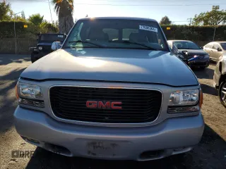 2000 GMC Denali z VIN 1GKEK63R8YR212220, wystawiony jako Copart lot #77606364 z przebiegiem 337 467 mil mil oraz Tytuł czysty. Historia ofert i sprzedaży dostępna na DreamBid. Obrazek 5.